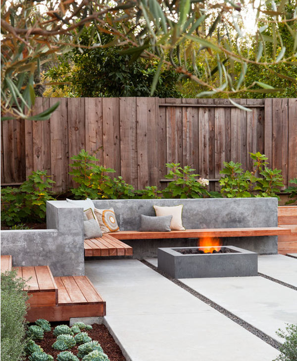 A combination of concrete and timber breathes life into this architectural delight. Via Arterra Landscape Architects